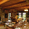 interior-fancy-image-of-country-style-interior-living-room-decoration-using-natural-stone-fireplace-including-rustic-solid-oak-wood-beam-ceiling-in-living-room-and-upholstered-light-brown-faux-leather
